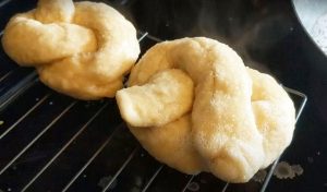 Homemade Soft Pretzels on Cooling Rack before Baking