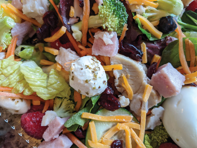 Delicious Fresh Salad Entree with Ham Cubes, Grilled Chicken, Fresh Mozzarella, Hard-Boiled Eggs, Raw Broccoli, Raspberries, and More!